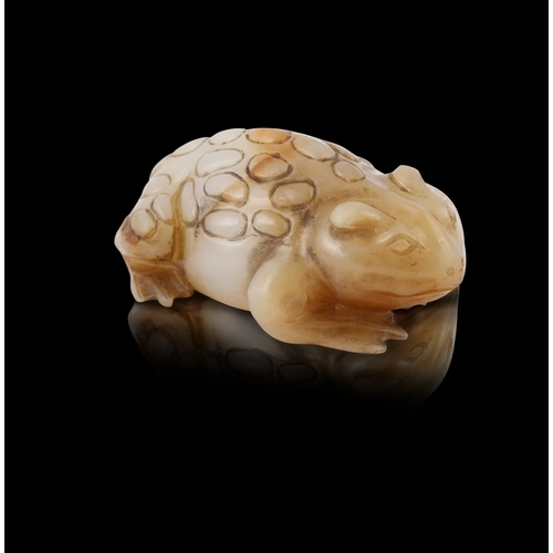 438 - A GREYNISH AND RUSSET JADE TOAD   清代 青玉蛤蟆   China, Qing dynasty   L.7.6cm