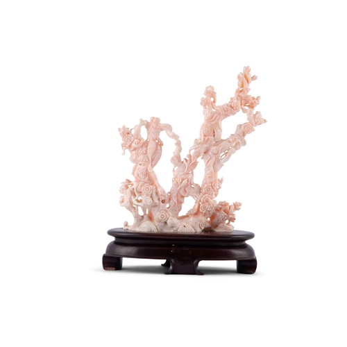 458 - *A PEAU D'ANGE CORAL GROUP OF TWO FEMAIL FIGRUES AND A CHILD ON A WOODEN STAND  China, 20th century ... 