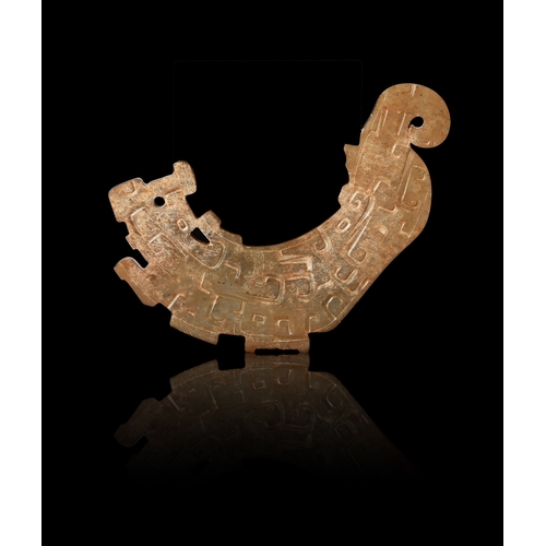 462 - A REDDISH-BROWN CARVED DRAGON JADE HUANG  周代 龙纹玉璜  China, Zhou ( 1046-256 BC)  Length: 12 cm, Width:... 