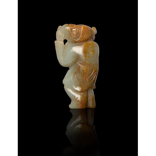 465 - A CELADON AND RUSSET JADE FIGURE HOLDING A FISH  清代 青玉年年有余童子  China, Qing dynasty  7.2cm