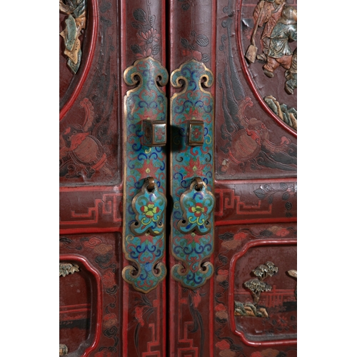 468 - A PAIR OF RED LACQUER AND CLOISONNÉ MOUNTED TWO-DOOR CABINETS,   late Qing, of upright rectangular f... 