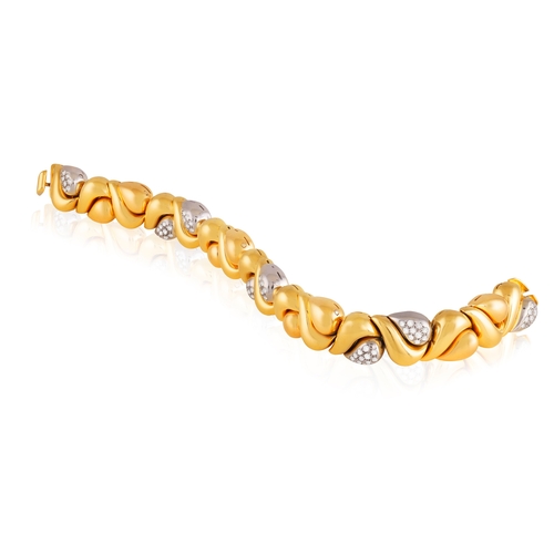 113 - AN 18K GOLD AND DIAMOND BRACELET  Of bi-coloured design, composed of alternating polished scrolled a... 