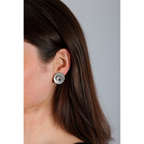 12 - MARGHERITA BURGENER: A PAIR OF DIAMOND AND TITANIUM EARRINGS  Each spiralled open hoop, highlighted ... 