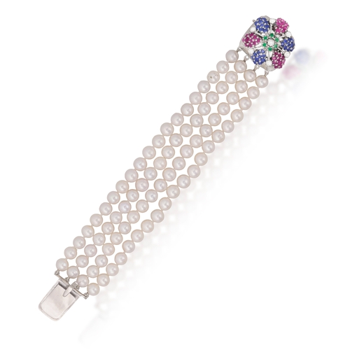 142 - SEAMAN SCHEPPS: A CULTURED PEARL AND GEM-SET BRACELET  Composed of four rows of cultured pearls, to ... 