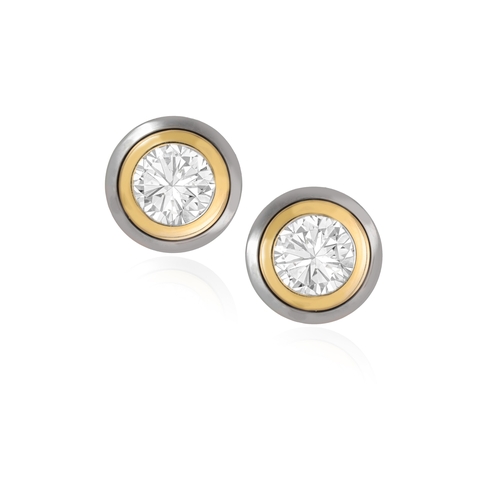 146 - FRIEDRICH: A PAIR OF DIAMOND EARSTUDS  Of bi-colour design, each brilliant-cut diamond within collet... 