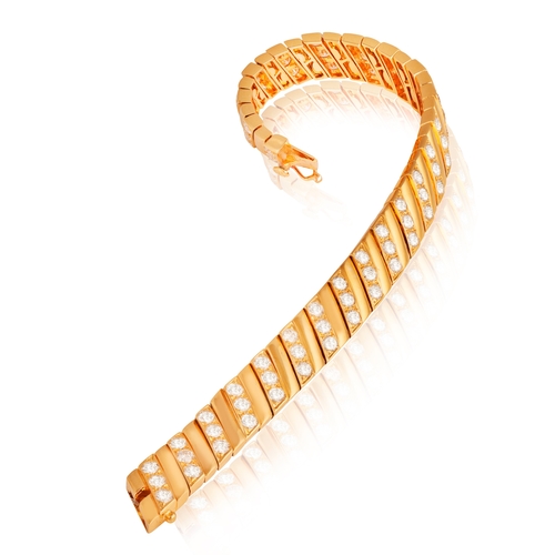 161 - VAN CLEEF & ARPELS: A FINE DIAMOND BRACELET, CIRCA 1990   Of articulated design, composed of polishe... 