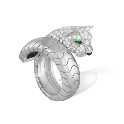 169 - CARTIER: A DIAMOND AND EMERALD 'PANTHÈRE' DRESS RING, FRENCH

The sprung ring designed as a panther,... 