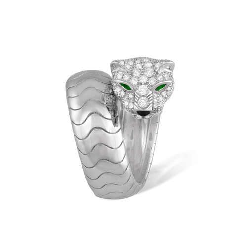 169 - CARTIER: A DIAMOND AND EMERALD 'PANTHÈRE' DRESS RING, FRENCH

The sprung ring designed as a panther,... 