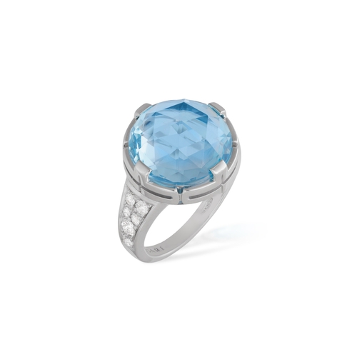 171 - BVLGARI: A BLUE TOPAZ AND DIAMOND ‘PARENTESI’ RING   Set with a rose-faceted circular-shaped blue to... 