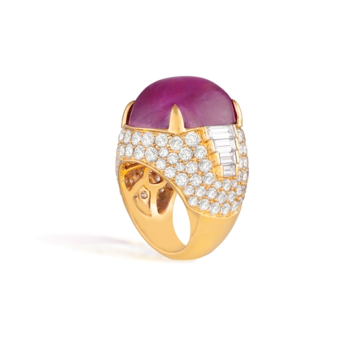 178 - BULGARI: AN IMPORTANT RUBY AND DIAMOND DRESS RING  Composed of a cushion-shaped cabochon ruby, withi... 