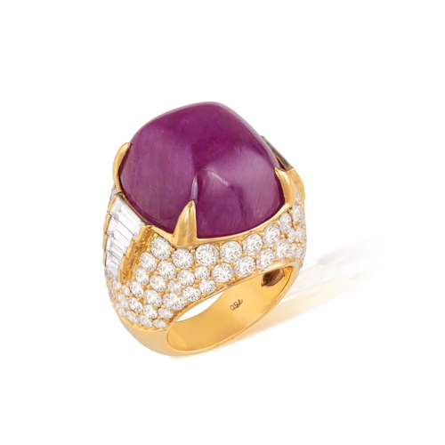 178 - BULGARI: AN IMPORTANT RUBY AND DIAMOND DRESS RING  Composed of a cushion-shaped cabochon ruby, withi... 