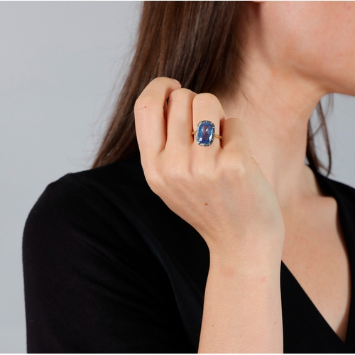 182 - A SAPPHIRE DRESS RING  Of Georgian style, the elongated cushion-shaped sapphire weighing 6.42cts, wi... 