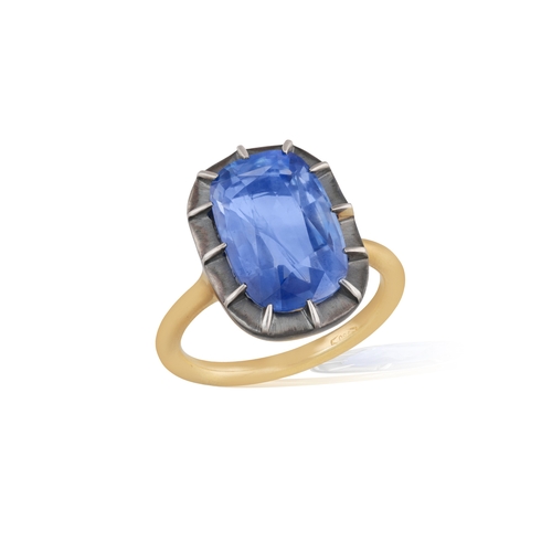 182 - A SAPPHIRE DRESS RING  Of Georgian style, the elongated cushion-shaped sapphire weighing 6.42cts, wi... 