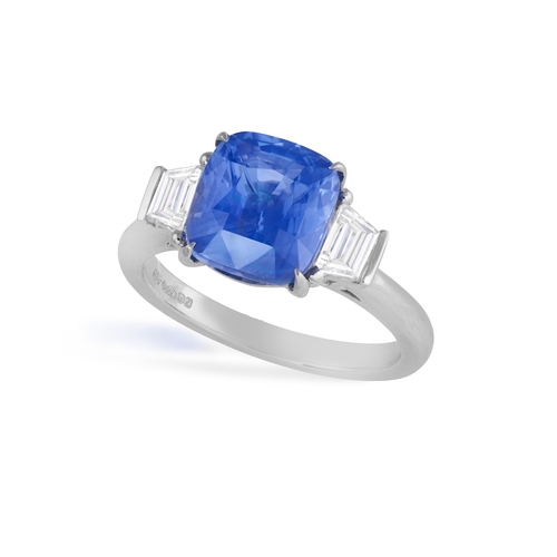 183 - A SAPPHIRE AND DIAMOND DRESS RING  The cushion-shaped sapphire weighing approximately 4.00cts, withi... 