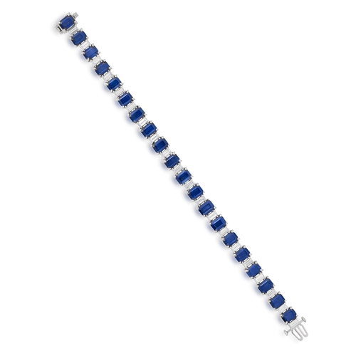 186 - A SAPPHIRE AND DIAMOND BRACELET  Composed of rectangular cut-cornered sapphires, set between baguett... 