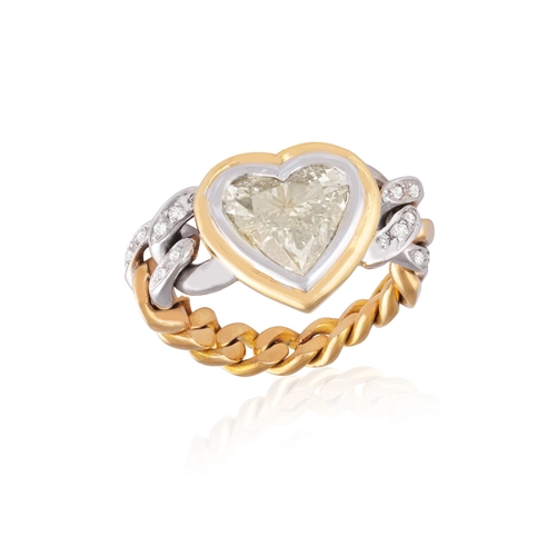 198 - A DIAMOND DRESS RING  Centring a collet-set heart-shaped diamond weighing approximately 3.00cts, bet... 