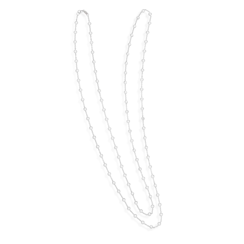 201 - A DIAMOND CHAIN NECKLACE  The cable-link chain interspersed with collet-set brilliant-cut diamonds, ... 