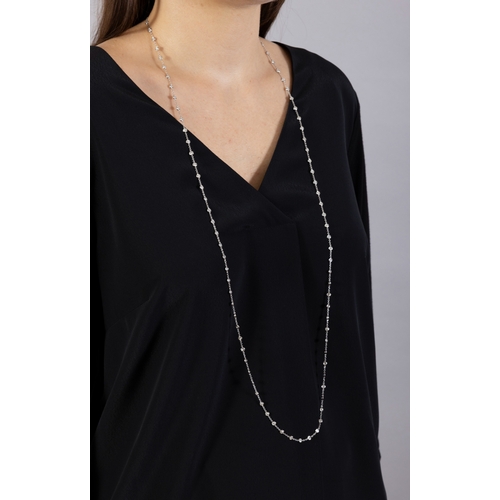 201 - A DIAMOND CHAIN NECKLACE  The cable-link chain interspersed with collet-set brilliant-cut diamonds, ... 