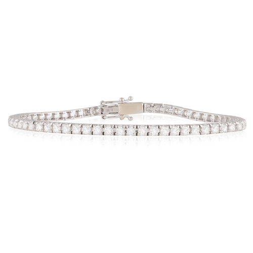 224 - A DIAMOND LINE BRACELET  The continuous row of brilliant-cut diamonds within claw-setting, mounted i... 