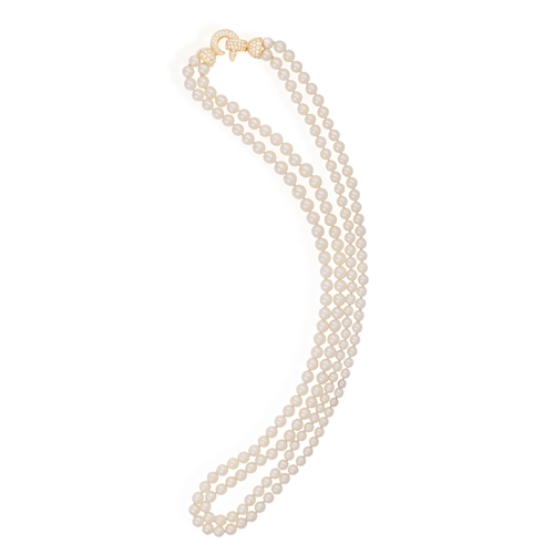 247 - A CULTURED PEARL NECKLACE WITH DIAMOND CLASP  Composed of two slightly graduated cultured pearl rows... 