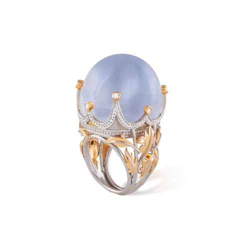 248 - A MOONSTONE AND DIAMOND COCKTAIL RING  The cushion-shaped moonstone cabochon weighing approximately ... 