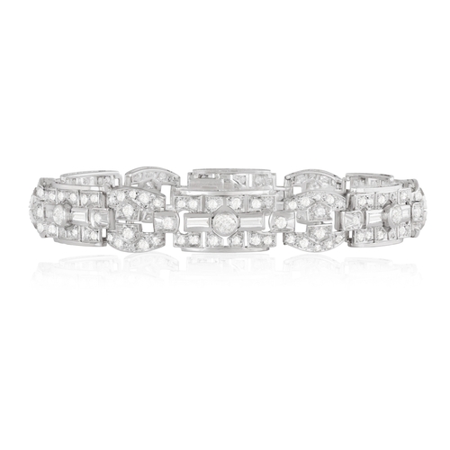 46 - AN ART DECO DIAMOND BRACELET, FRENCH, CIRCA 1920  Composed of a series of openwork geometric convex ... 