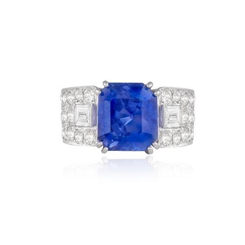 47 - AN ART DECO SAPPHIRE AND DIAMOND DRESS RING  The rectangular cut-cornered sapphire weighing approxim... 