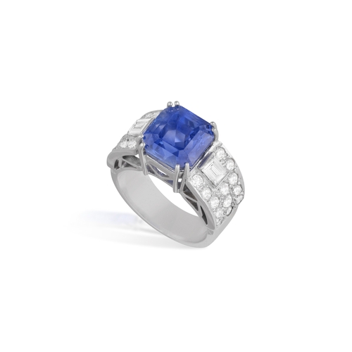 47 - AN ART DECO SAPPHIRE AND DIAMOND DRESS RING  The rectangular cut-cornered sapphire weighing approxim... 