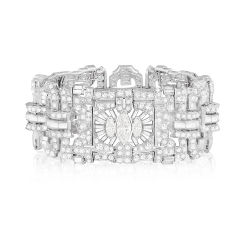 50 - AN IMPORTANT DIAMOND BRACELET, CIRCA 1940  Of openwork design, composed of three panels centring mar... 