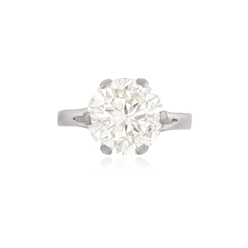 75 - A DIAMOND SINGLE-STONE RING  The brilliant-cut diamond weighing approximately 5.30cts, within a six-... 