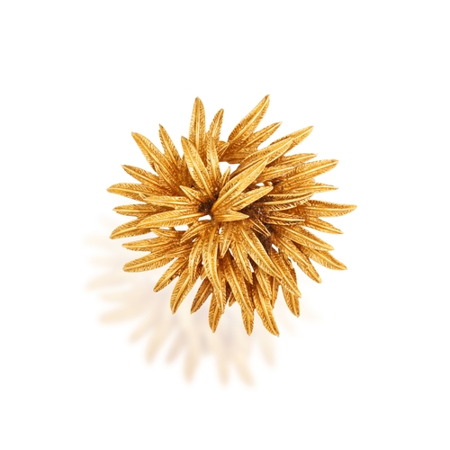 77 - TIFFANY & CO: AN 18K GOLD BROOCH, CIRCA 1960   Of textured naturalistic leaf design, in 18K gold, si... 