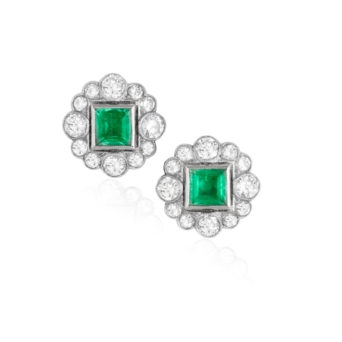 78 - A PAIR OF EMERALD AND DIAMOND EARSTUDS   Each of cluster design, centring a square-shaped emerald, w... 