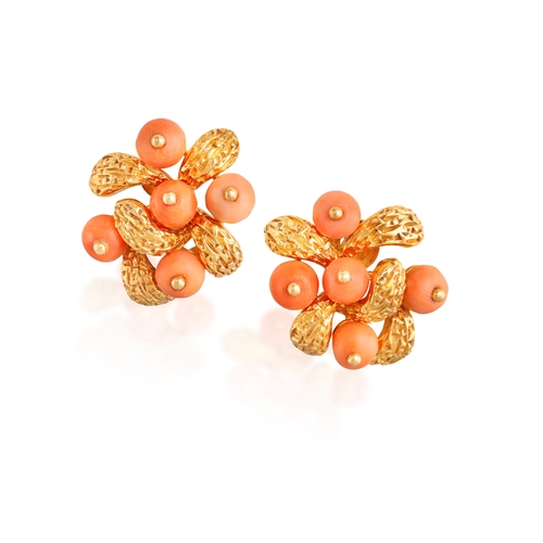 80 - VAN CLEEF & ARPELS: A PAIR OF CORAL EARCLIPS, CIRCA 1965-1970  Each textured gold cluster embellishe... 