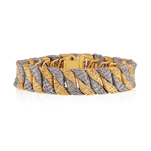 83 - GEORGES LENFANT FOR O.J PERRIN: A COLLECTIBLE BI-COLOURED GOLD BRACELET, CIRCA 1970

Composed of a s... 