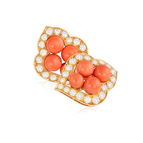 84 - VAN CLEEF & ARPELS: A RARE PAIR OF CORAL AND DIAMOND EARCLIPS, CIRCA 1975  Of openwork scalloped des... 