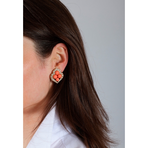 84 - VAN CLEEF & ARPELS: A RARE PAIR OF CORAL AND DIAMOND EARCLIPS, CIRCA 1975  Of openwork scalloped des... 