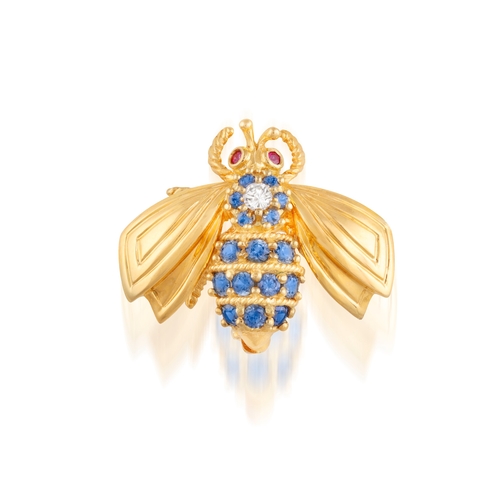 98 - TIFFANY & CO.: A GEM-SET AND DIAMOND NOVELTY BROOCH  Designed as a stylised bee, its body set with c... 