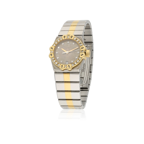 119 - CHOPARD   REF. 8024, St-MORITZ  A two-tone stainless steel 18K Yellow gold and diamond bezel quartz ... 