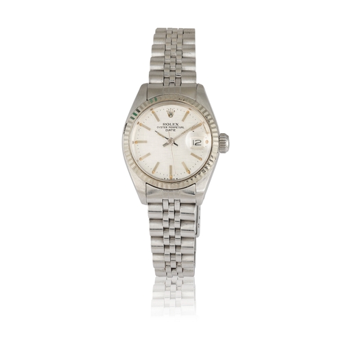 132 - ROLEX   REF. 6517, OYSTER PERPETUAL DATE  A stainless steel, self winding lady’s wristwatch with dat... 