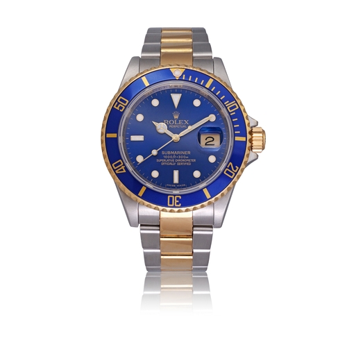 137 - ROLEX   REF.16613T SUBMARINER DATE, BLUE DIAL, COMPLETE SERVICE 2023  A stainless steel and 18K gold... 