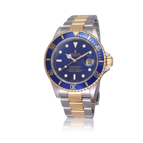 137 - ROLEX   REF.16613T SUBMARINER DATE, BLUE DIAL, COMPLETE SERVICE 2023  A stainless steel and 18K gold... 