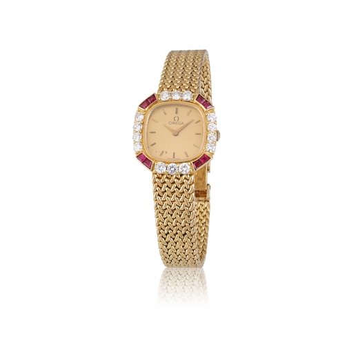 20 - OMEGA  An 18K yellow gold, diamond and ruby-set lady’s quartz wristwatch.  Year : C.1990 Dial : Gold... 