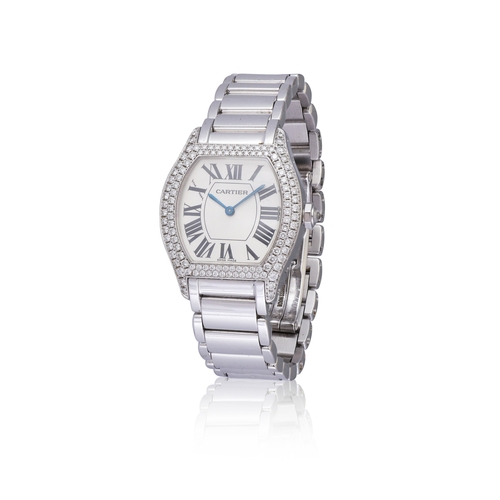 24 - CARTIER   REF. Ref. 2644, TORTUE, 18K WHITE GOLD  An 18K white gold manual winding bracelet watch, o... 