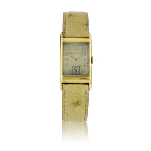 37 - JAEGER LECOULTRE   CURVED RECTANGULAR  A curved rectangular subsidiary seconds wristwatch, 18K Yello... 