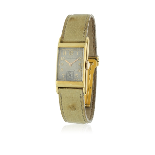 37 - JAEGER LECOULTRE   CURVED RECTANGULAR  A curved rectangular subsidiary seconds wristwatch, 18K Yello... 