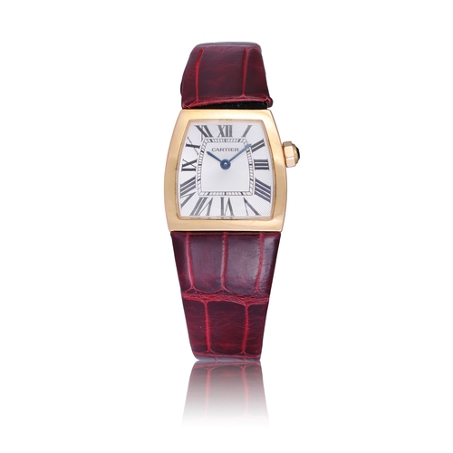 41 - CARTIER   REF. 2904, LA DONNA, 18K YELLOW GOLD  An 18K yellow gold, asymmetrical tonneau shaped Quar... 