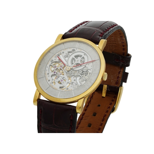 62 - AUDEMARS PIGUET  ULTRA-THIN SKELETON  A well-preserved, 18k yellow gold Ultra-Thin skeletonised manu... 