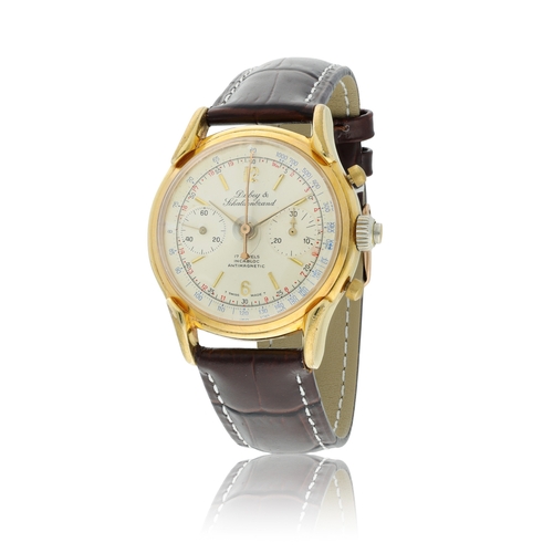 99 - DUBEY & SCHALDENBRAND   SPIRAL RATTRAPANTE  A manual wind, gold-plated chronograph split-second wris... 