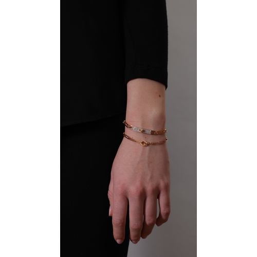 122 - HERMÈS: A DIAMOND 'KELLY CHAIN DOUBLE' BRACELET, 2023  The elongated cable-link chain, highlighted w... 