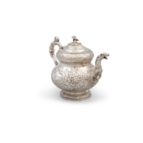 101 - AN IRISH SILVER GEORGE IV TEAPOT,   Dublin 1821, mark of William Nolan, with flower head finial, the... 